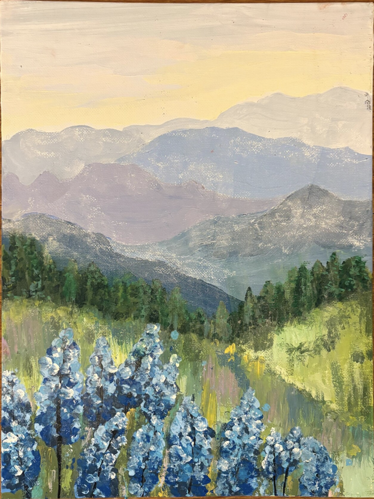 A landscape painting of blue flowers in the foreground, green trees and hills in the middle, and purple mountains with a yellow and pink sky in the background.