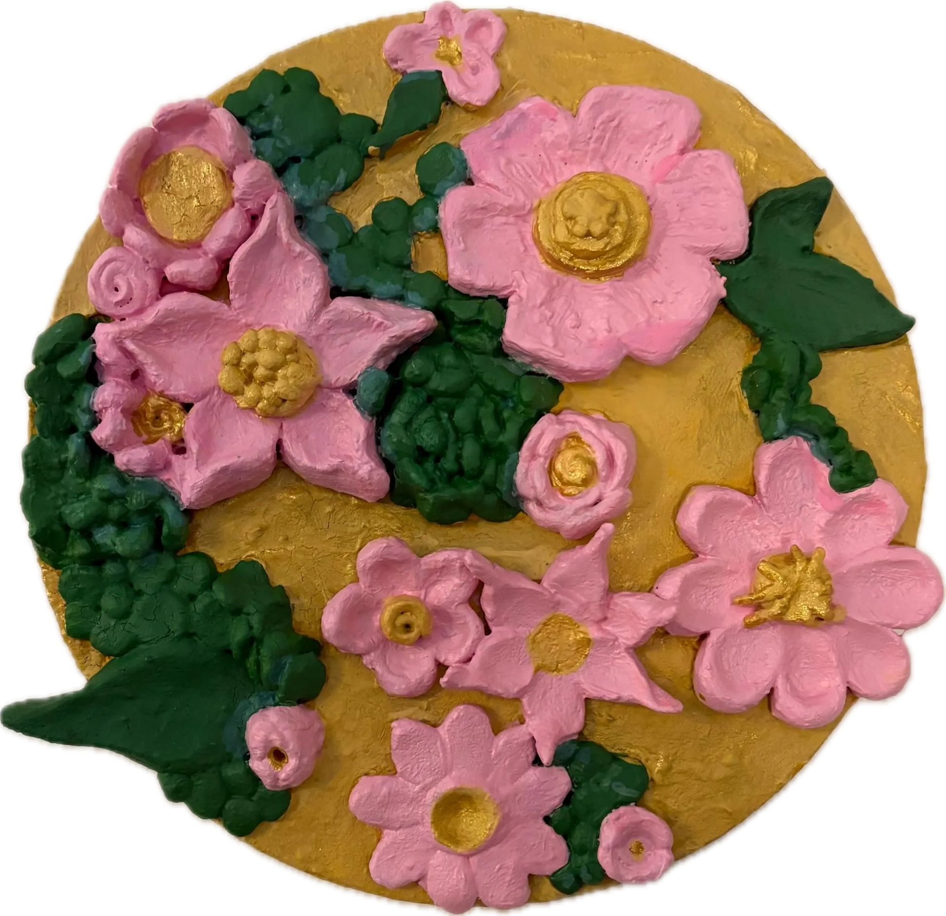 Decorative round cake with pink flower and green foliage icing decoration.