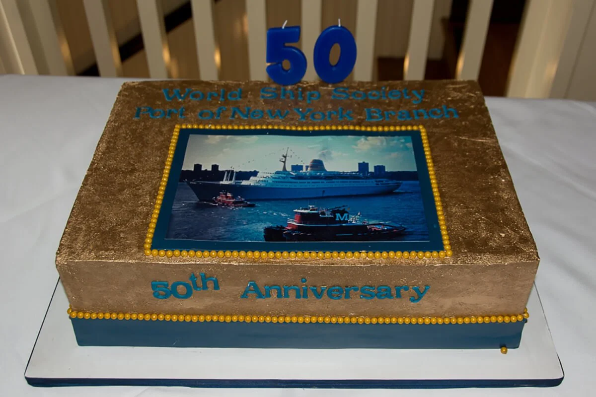 SAGAFJORD, the first PONY meeting location, is on the anniversary cake.