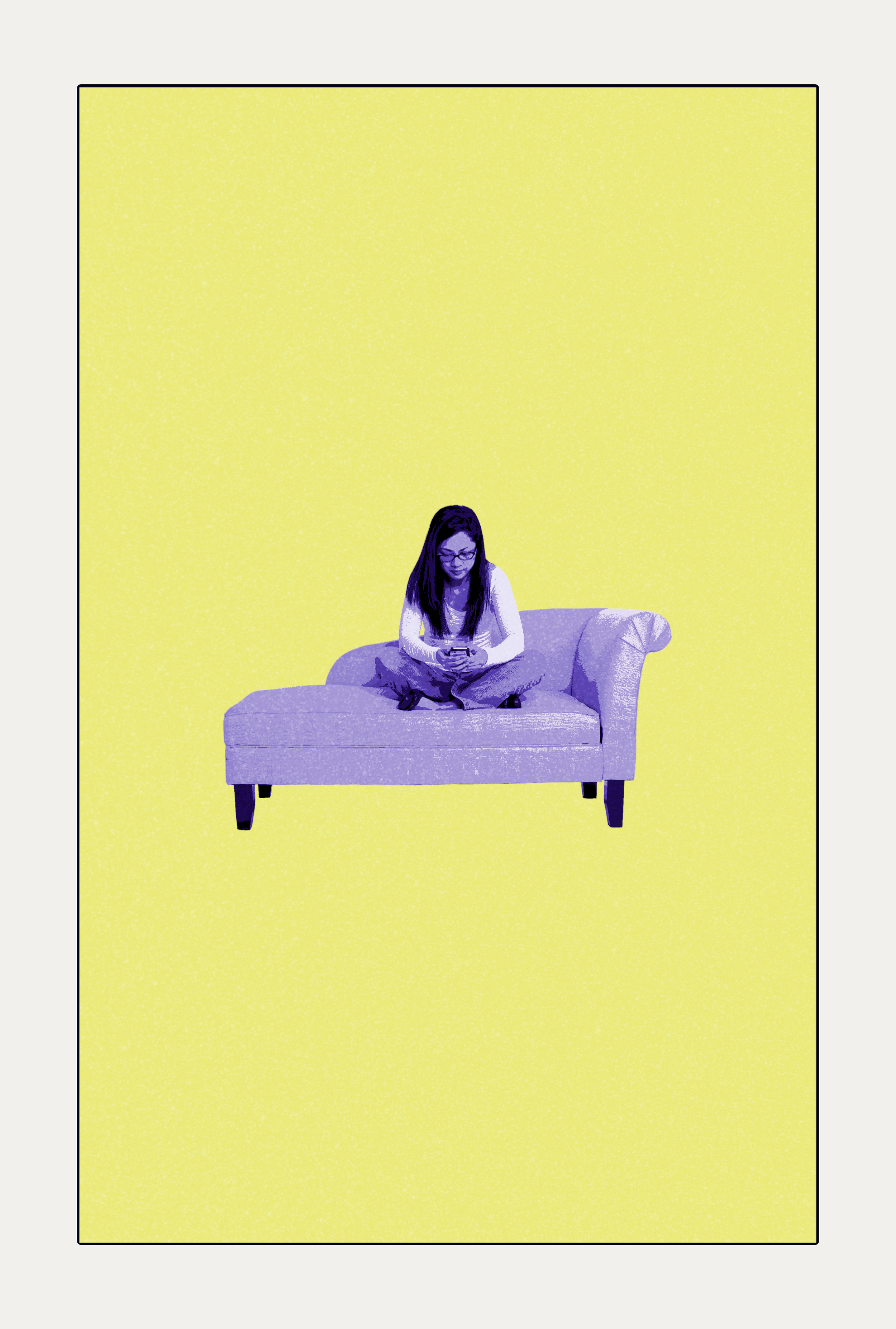 A woman sitting cross-legged on a sofa, looking at her phone, with a yellow background.