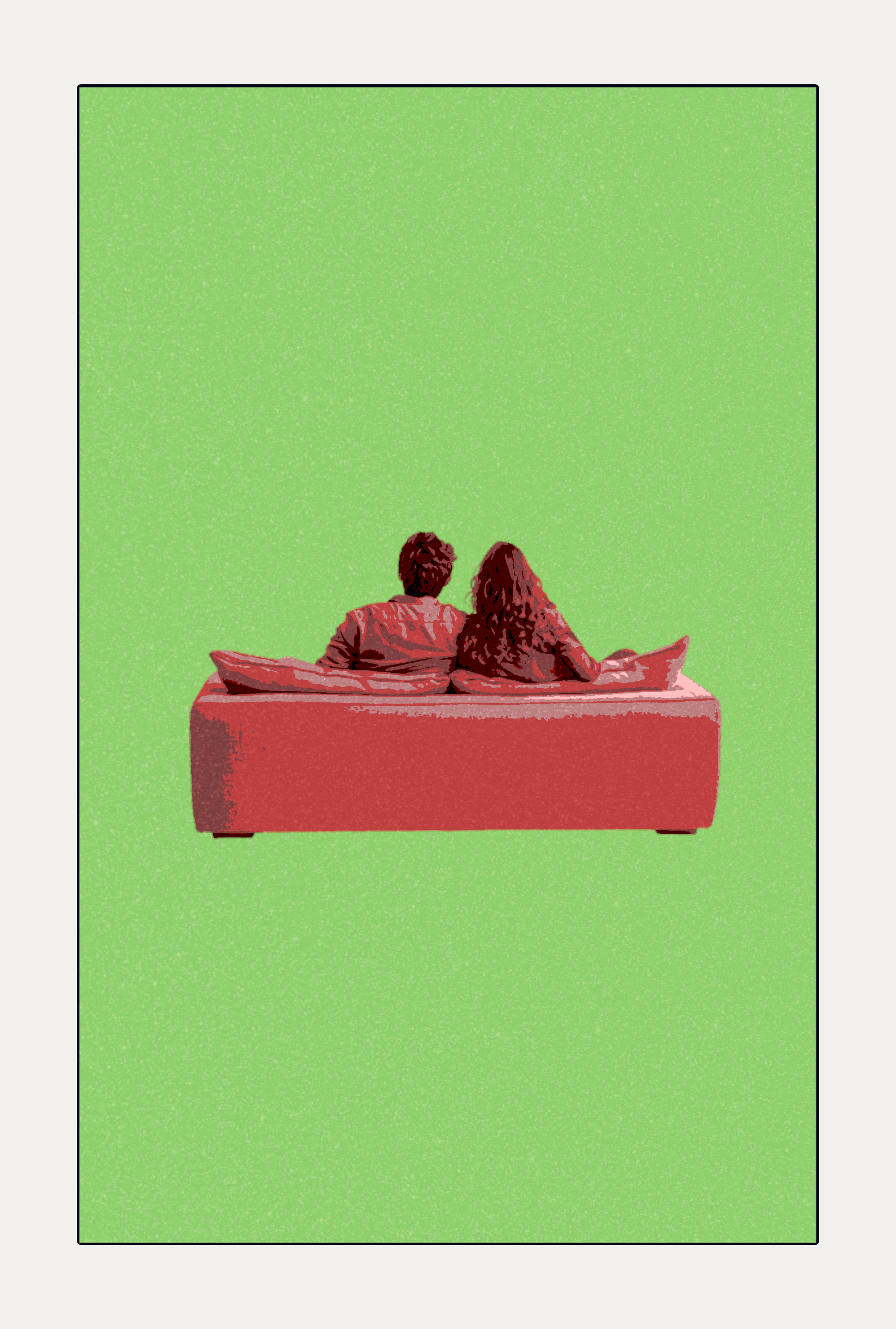 A couple sitting on a red bench, viewed from behind, looking at a green screen.
