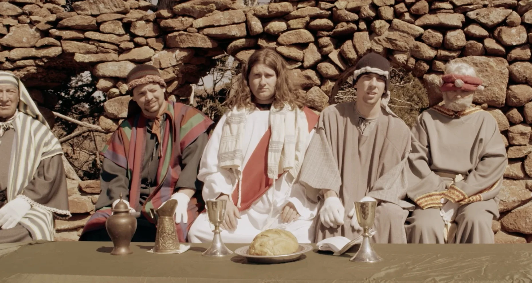 Still from JesusTown USA documentary, edited by Genea Gaudet, showing an Easter pageant Last Supper scene