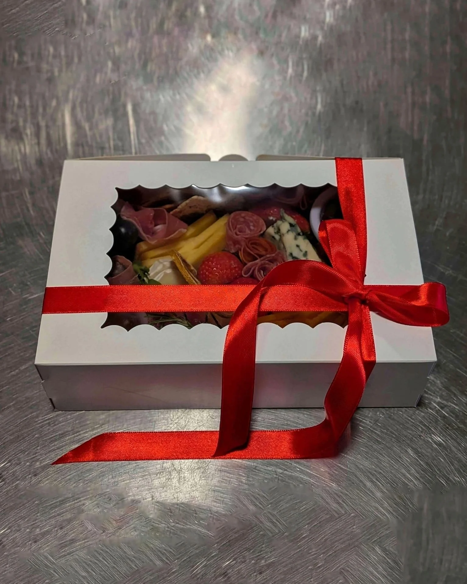 Skip the reservations this Valentine&rsquo;s Day and cozy up with our specially curated Charcuterie Box for Two. Featuring a premium selection of meats, artisan cheeses, and fresh fruit, it&rsquo;s the perfect way to share the love.

​The best part? 
