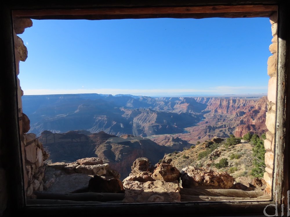 This framed view of the Grand Canyon is from the patio at Hermit's Rest. Built by Mary Colter in 1914 as a stagecoach stop on the South Rim, it serves today as a gift shop and refreshment stand. Colter's signature touches include a mounted Spanish mi