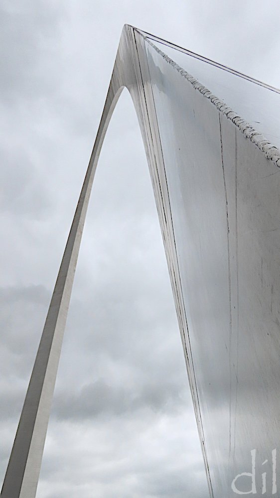 The silvery skin of the arch merged into the sky on this overcast afternoon. The perspective from the top was also a surprise.