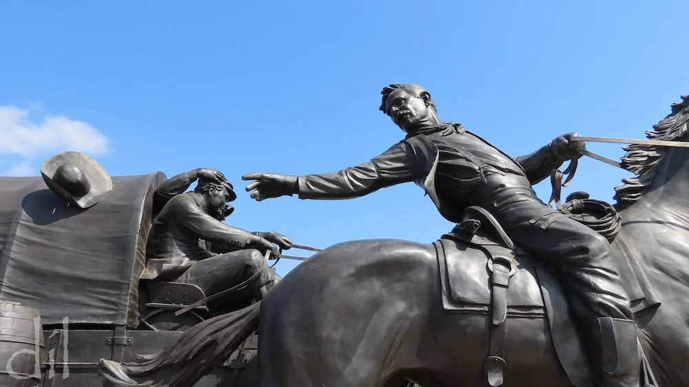 Created by noted sculpture artist Paul Moore, the Centennial Land Run Monument in Oklahoma City depicts the Land Rush of 1889. Featuring 45 bronze figures, the epic monument spans an area bigger than a football field.