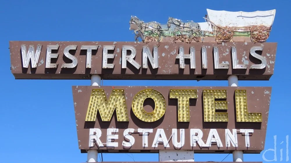 Route 66 kitsch in the tourist-friendly Grand Canyon gateway town of Flagstaff could fill a photo gallery of its own. You'll suffer whiplash in your efforts to capture it all. Above is one of the older examples, the 1950 Western Hills Motel sign, cap