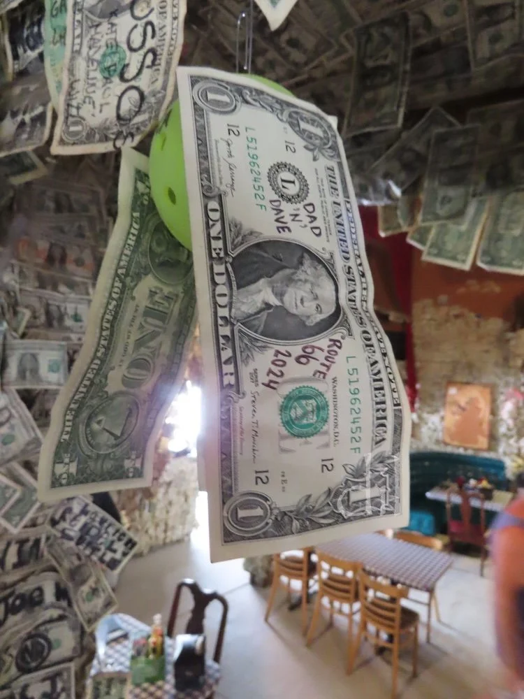 Oatman, Ariz., high up past sidewinding roads, is a must-see Route 66 highlight. The ramshackle town is all schticky signs and wild donkeys, its hotel restaurant (above) wallpapered in dollar bills. Don't ask, just go!
