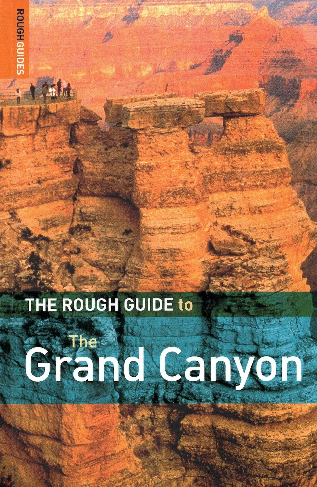 Cover of a guidebook "The Rough Guide to the Grand Canyon." The cover features a scenic photograph of the Grand Canyon's layered rock formations and cliffs, displaying shades of orange, brown, and blue.