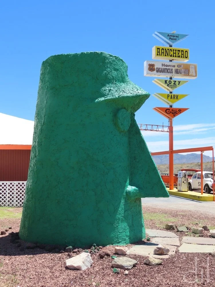 West of Seligman, Route 66 and I-40 part ways. Sixty miles out on the Mother Road is the Antares Point Visitor Center, another oasis of mid-century Americana. Here you'll find Giganticus Headicus. Who needs Easter Island?