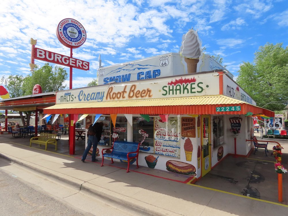 The Delgadillo family enterprises in Seligman, Ariz., speak to determination and highlight the resilience of free enterprise. Angel Delgadillo opened his barber shop here on Route 66 in 1950, brother Juan the Snow Cap Drive-in (above) in 1953. When I