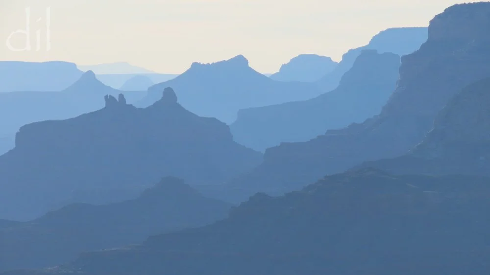 The Grand Canyon is 10 to 12 miles across from South Rim to North Rim and a mile down to the Colorado River. Its immensity is virtually impossible to describe to the uninitiated. Most photos only flatten its scale into a painterly representation. Vis