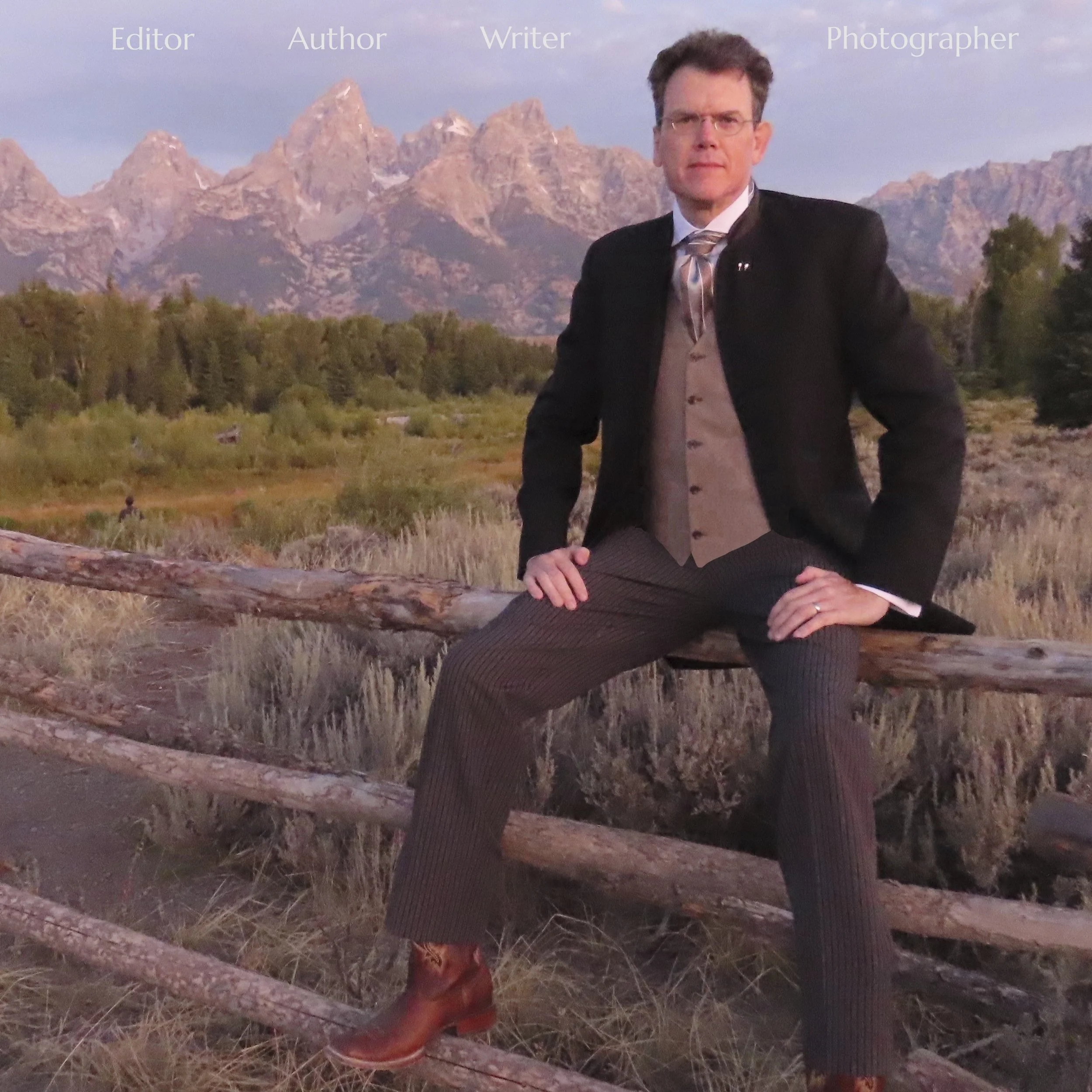 David Lauterborn, wearing a morning suit at dawn on the day of his and wife Jill's silver anniversary, sits atop a fence rail at Schwabacher's Landing, north of Jackson, Wyoming, with the Teton Range in the background.