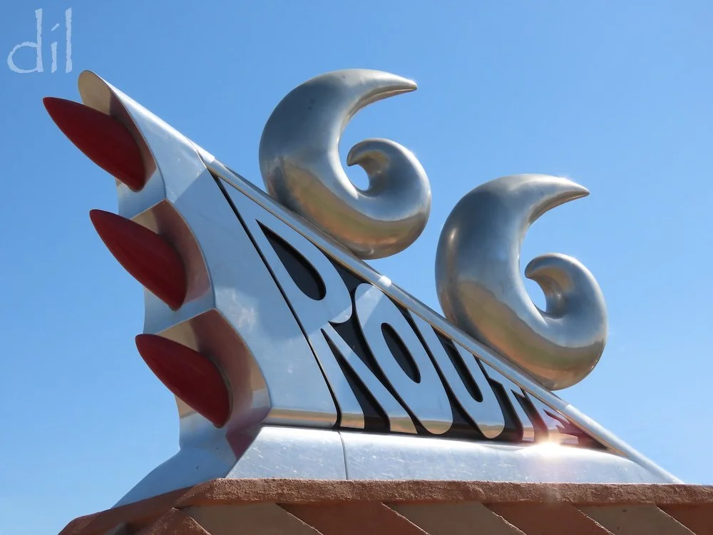 In 1997 New Mexico officials commissioned artist Tom Coffin to memorialize the legacy of Route 66. The result is the Mother Road Monument, outside the New Mexico Route 66 Museum, its shape echoing the taillights of a late-1950s Desoto.