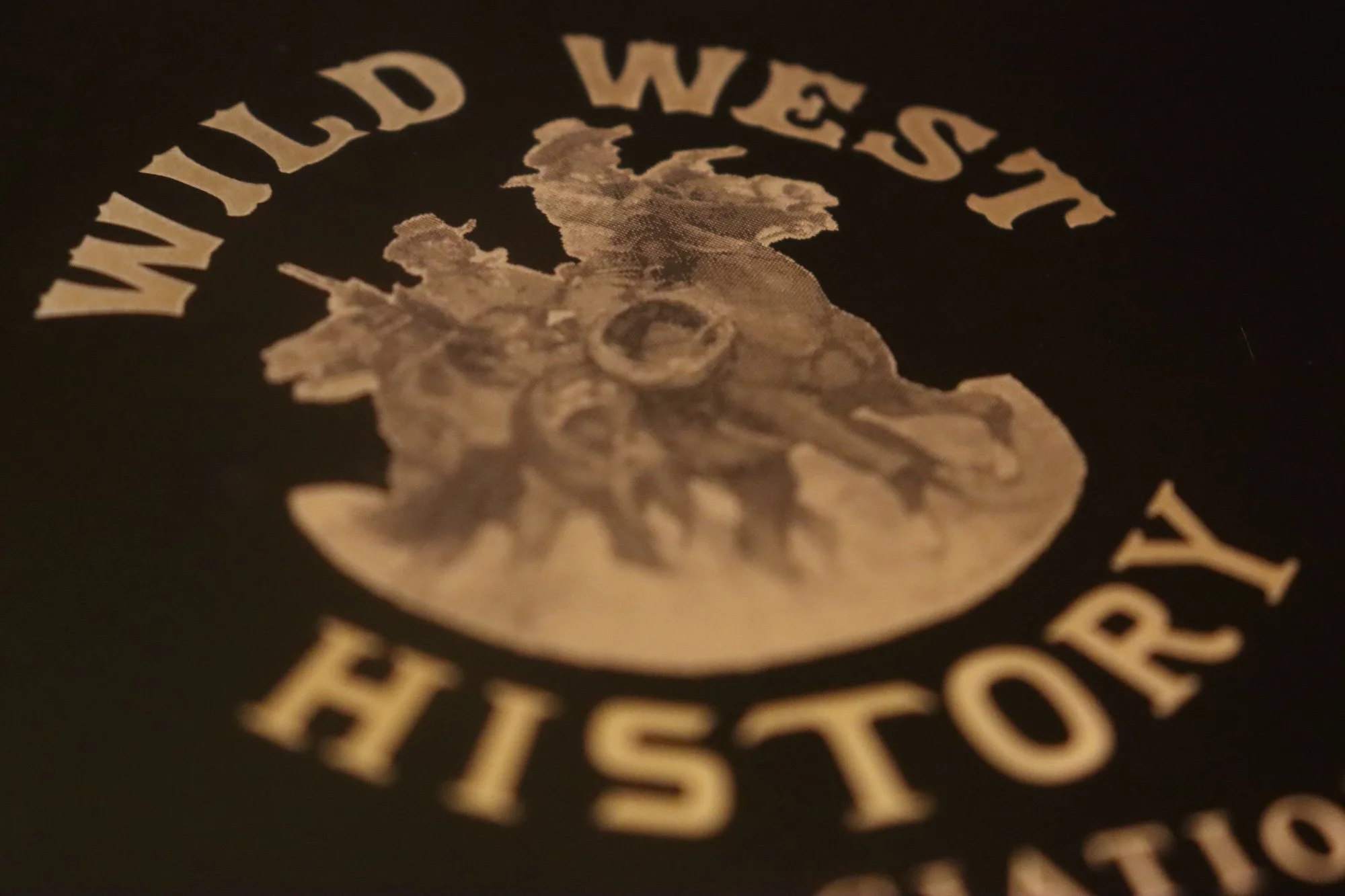 Close up of a Six Shooter Award from the Wild West History Association.