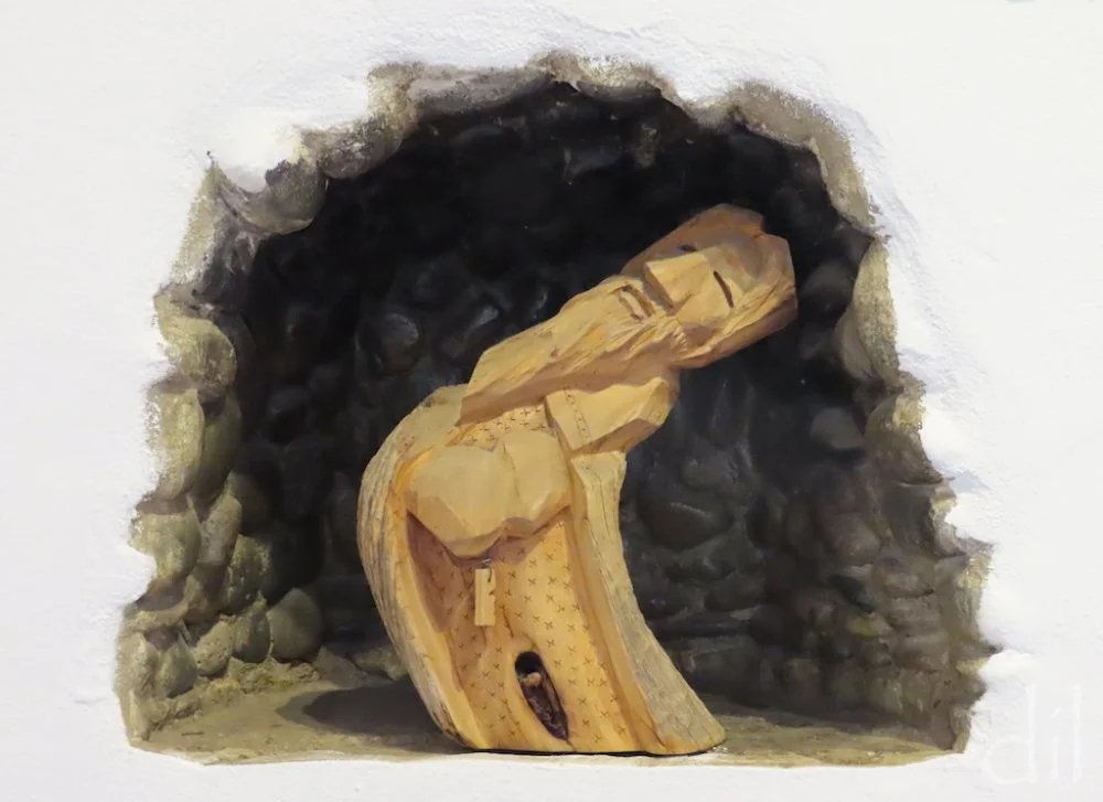 A day trip north of the Mother Road, the Chimayó Valley and Taos beyond are also steeped in regional artistic traditions. This carved fellow graces a nook at the entrance of Rancho de Chimayó Restaurant.