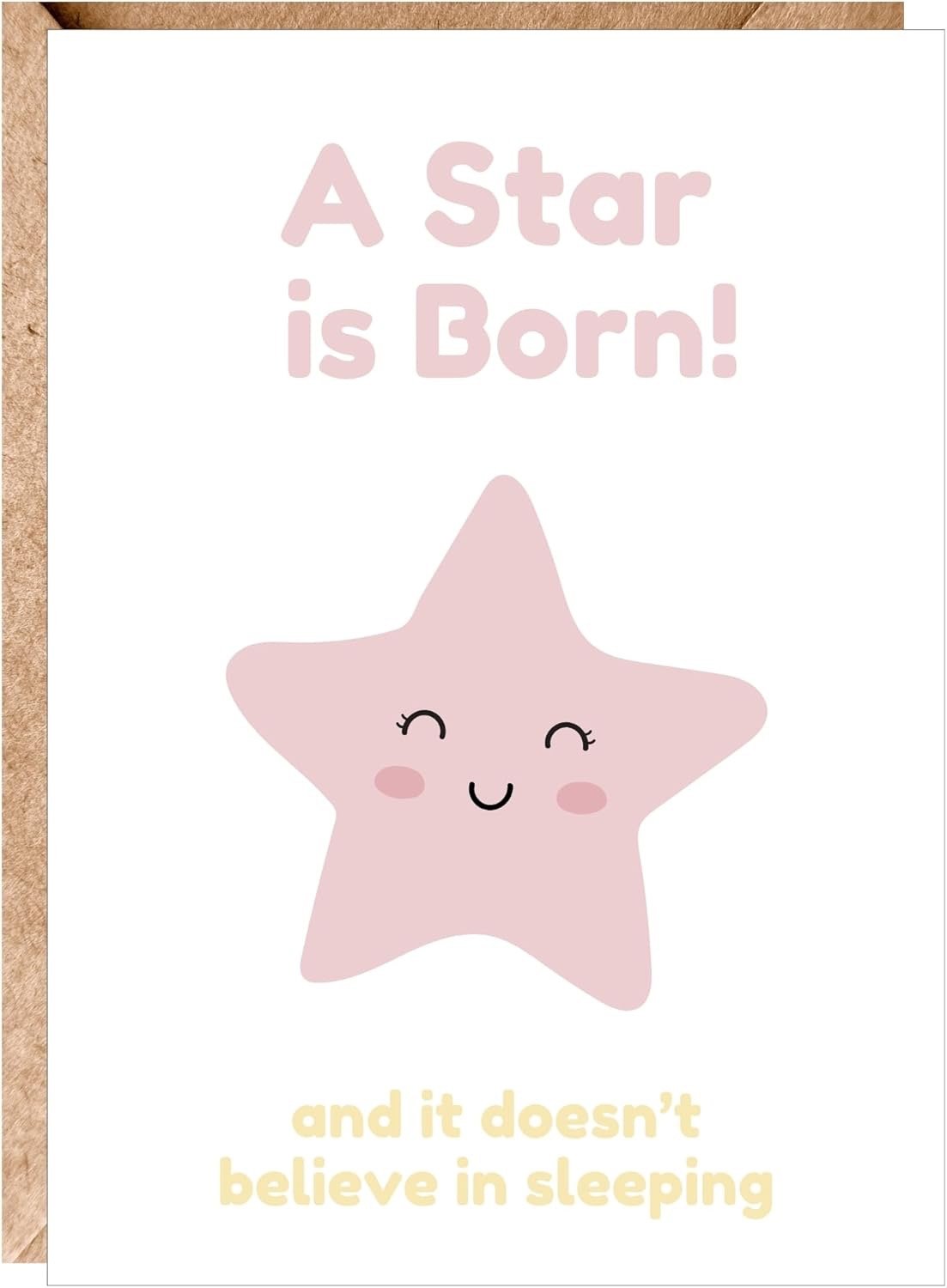A poster featuring a pink smiling star with rosy cheeks, with the text "A star is born!" at the top and "and it doesn't believe in sleeping" at the bottom, on a white background with a beige border.