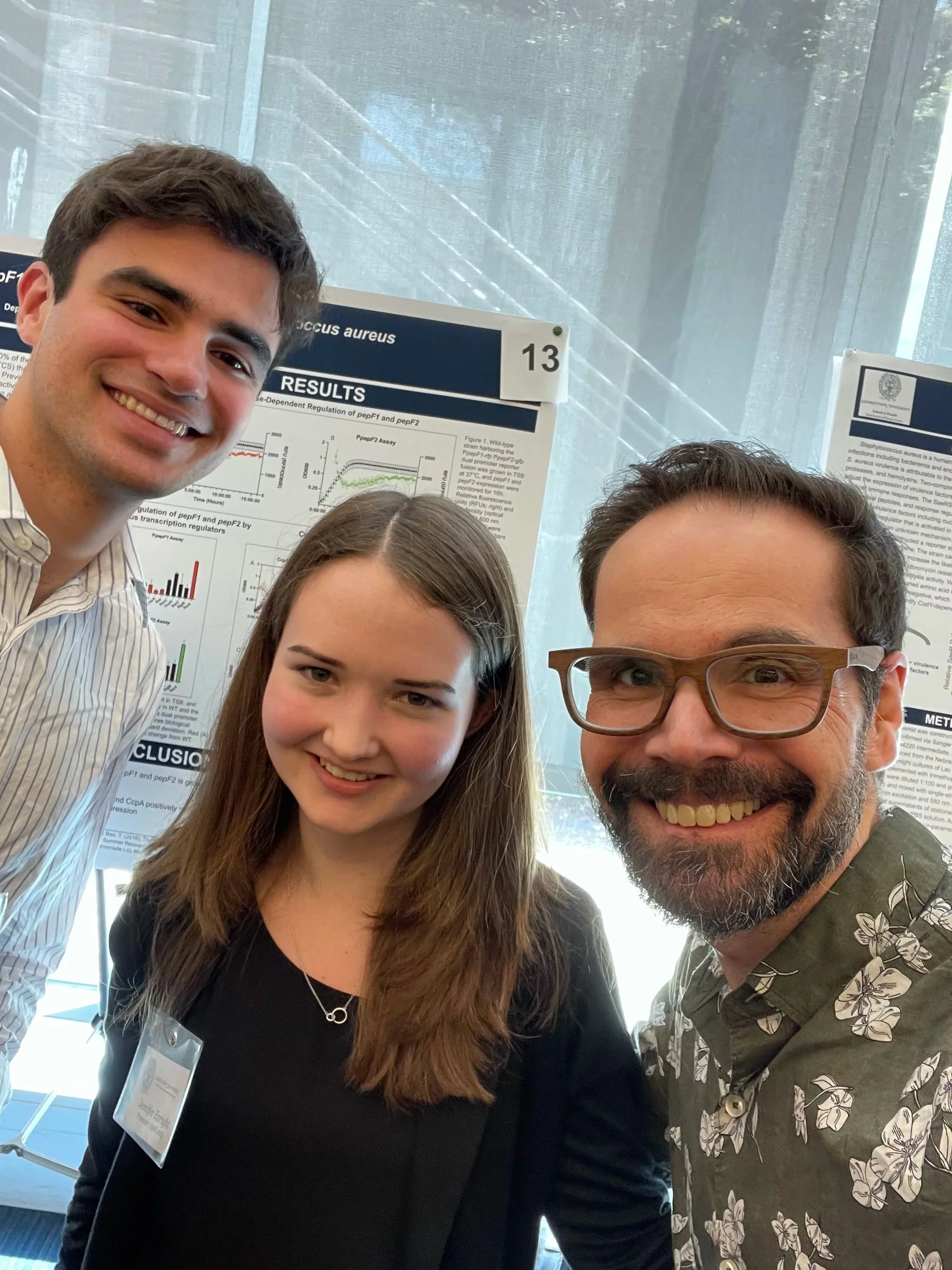 Dan, Jennifer, Shaun at the 2023 GU Undergraduate Research Conference