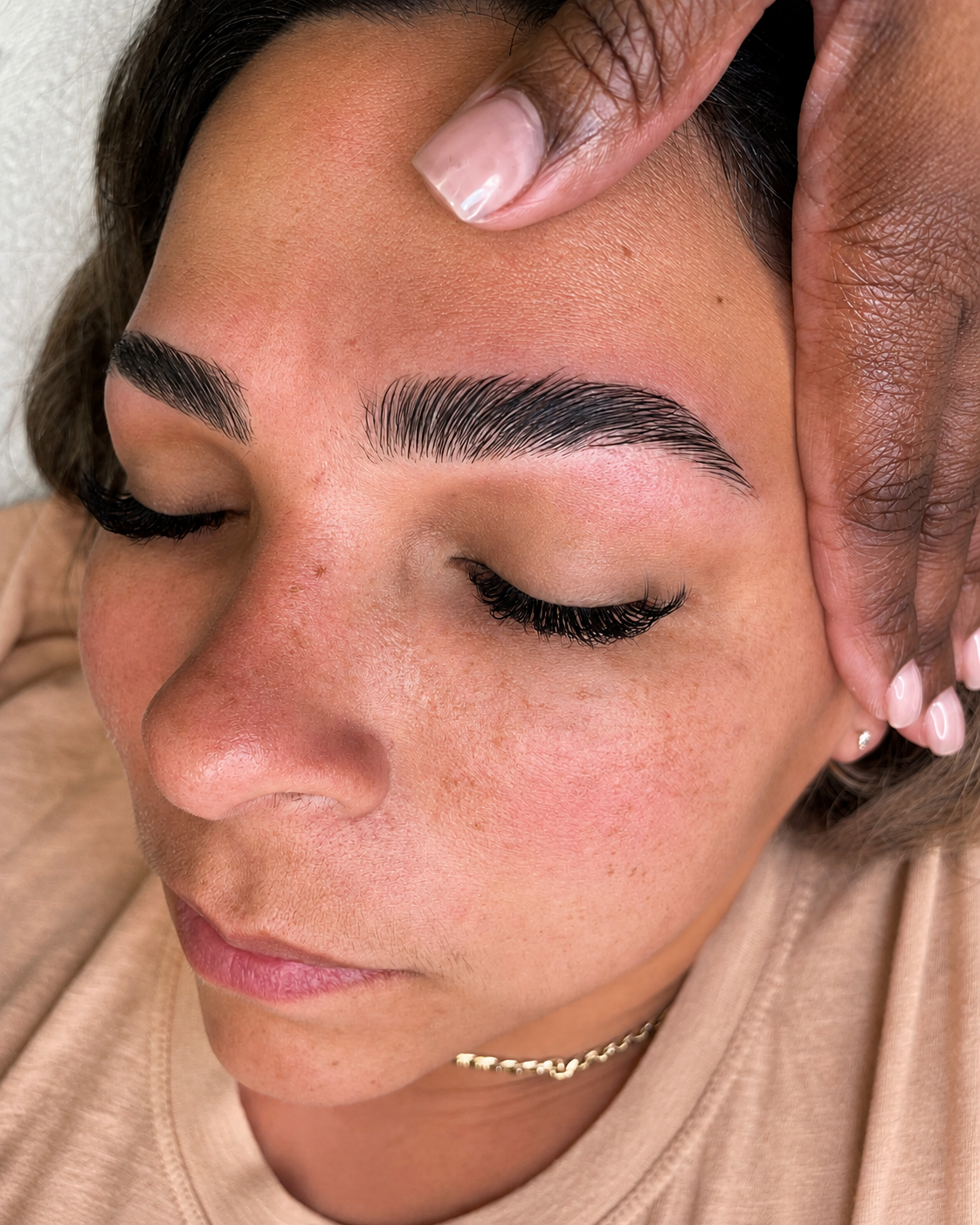 Guest received a classic lash extensions + brow shaping