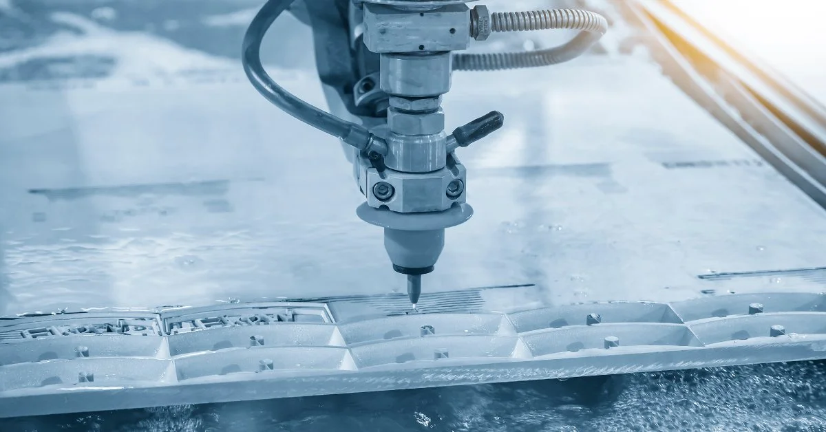 A robotic machine drilling into a metal surface in a manufacturing or industrial setting.