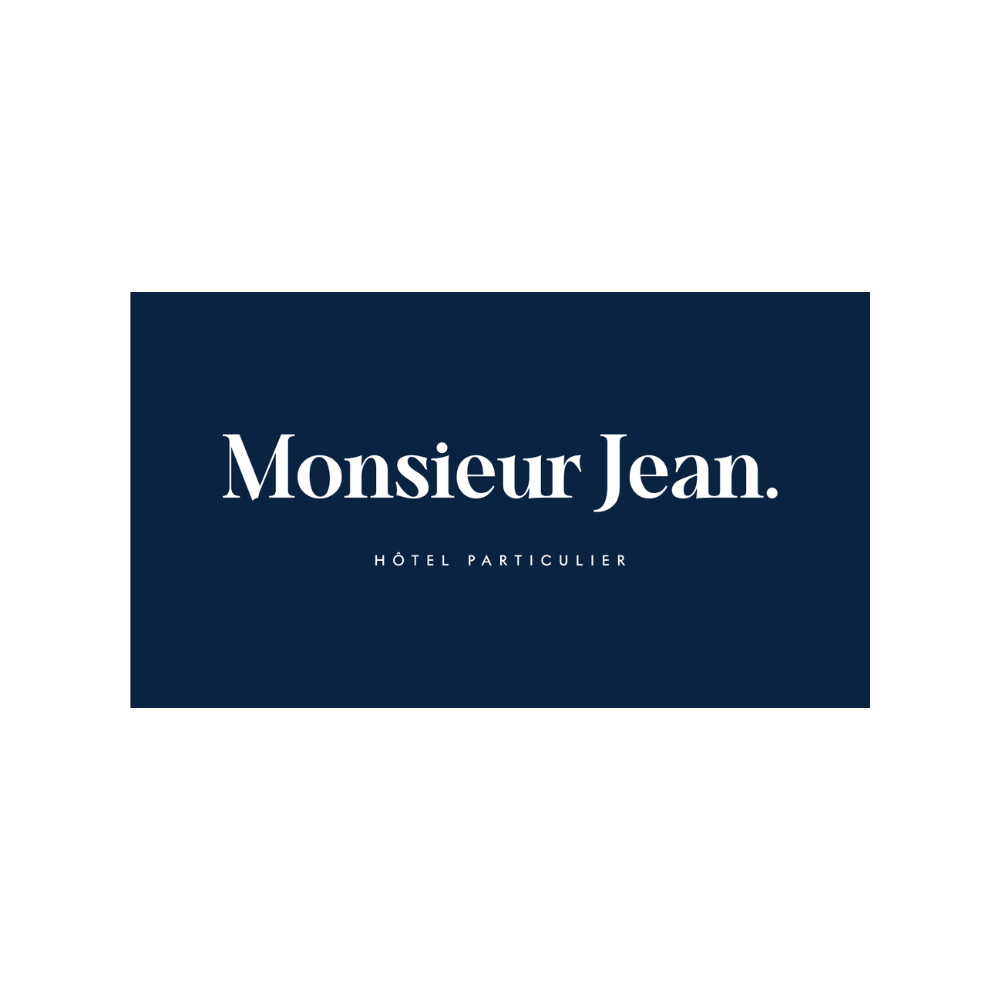 Logo for Monsieur Jean, a boutique hotel, with navy background and white text.