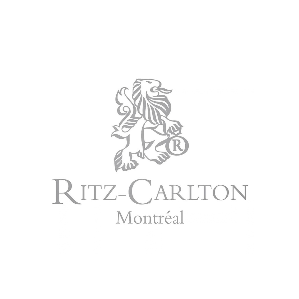 Ritz-Carlton logo featuring a stylized lion mascot and text 'Ritz-Carlton Montreal'
