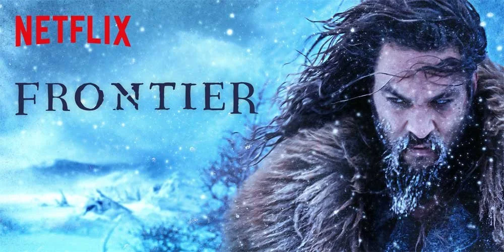 Jason Momoa as Declan Harp in a rugged wilderness setting in the historical drama series Frontier.