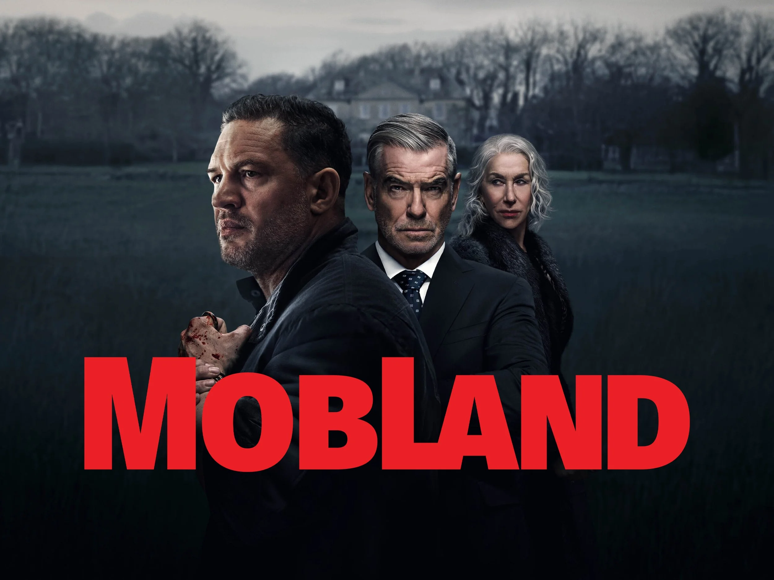 Promotional poster for the TV series 'Mobland' featuring three characters with serious expressions, standing outdoors with a dark and moody background, and the title 'Mobland' in bold red letters. British crime series.