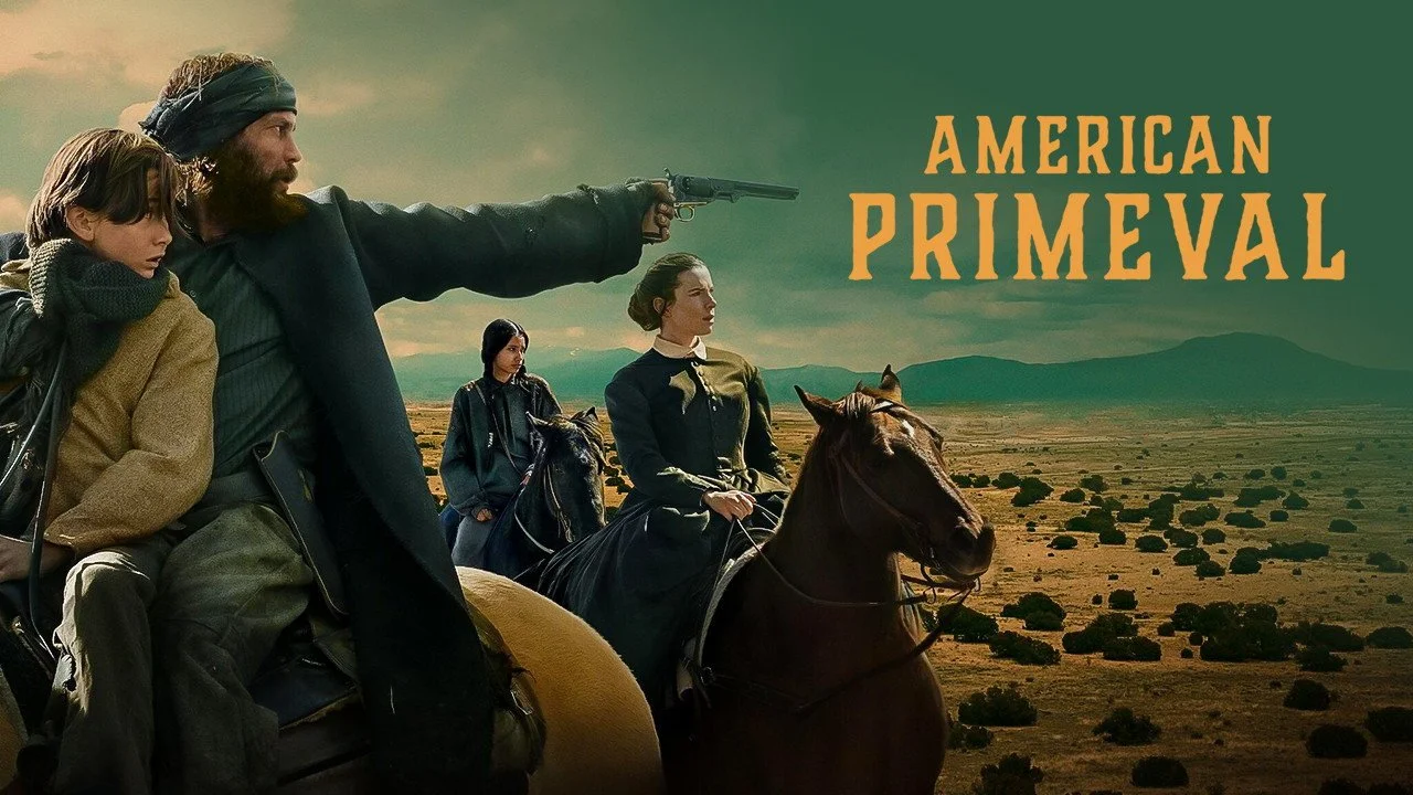 Taylor Kitsch as Abish traversing rugged wilderness in a scene from the Western miniseries American Primeval.