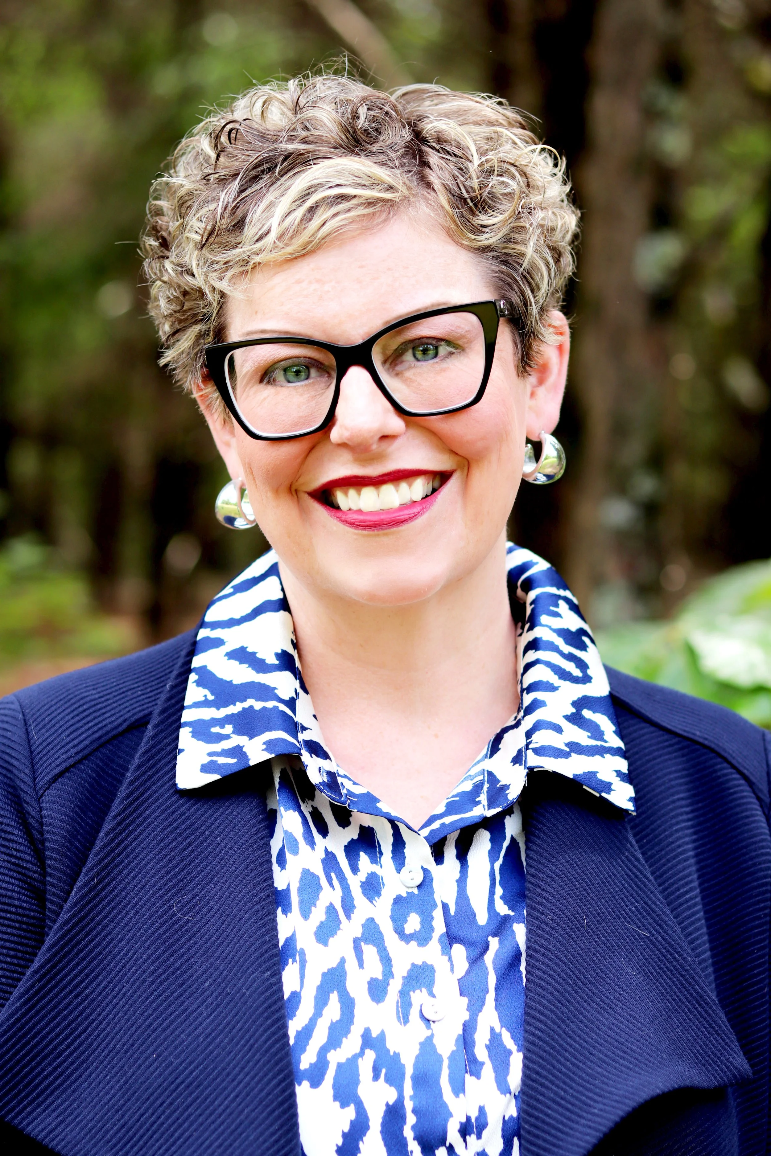 Professional headshot of Cara Graham, founder of Above the Bar Advocacy