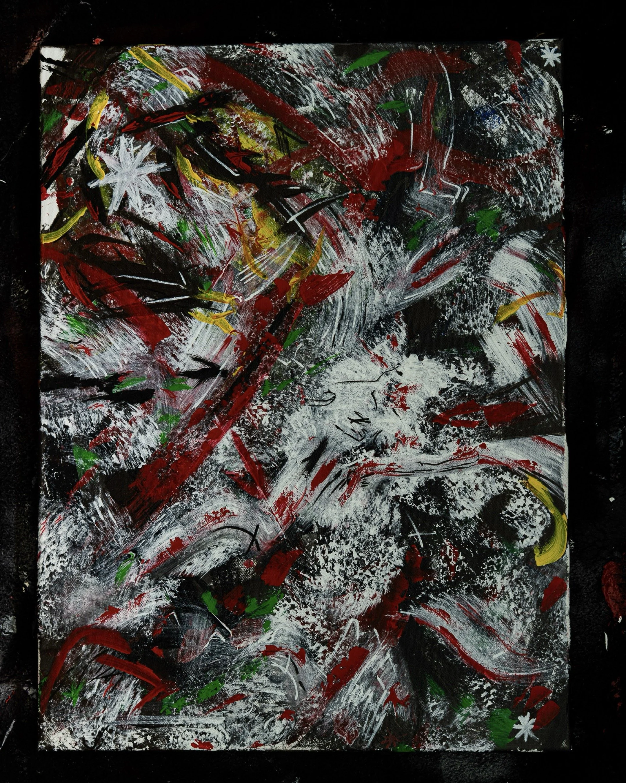 Abstract painting with red, white, yellow, green, blue, and black brushstrokes and splatters on a black background.