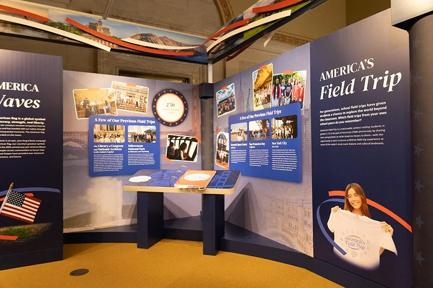 exhibit panels with photos, text and a flip book describing America's Field Trip programming.