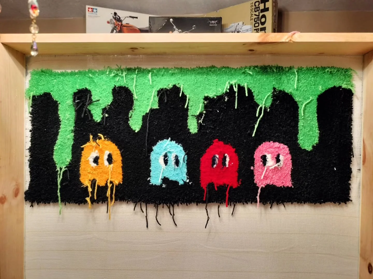 It looks scarier if I just leave the yarn scraps hanging off of it 😂
I finished tufting this yesterday! But before I glue and cut it out I want to use the second half of the canvas for another rug and then finish them at the same time. 
What other r
