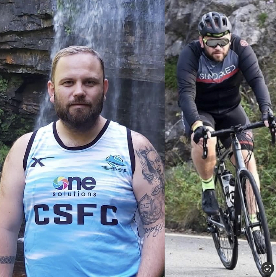 A man in a blue sports jersey with tattoos standing in front of a waterfall, and another man wearing a helmet riding a mountain bike on a trail.