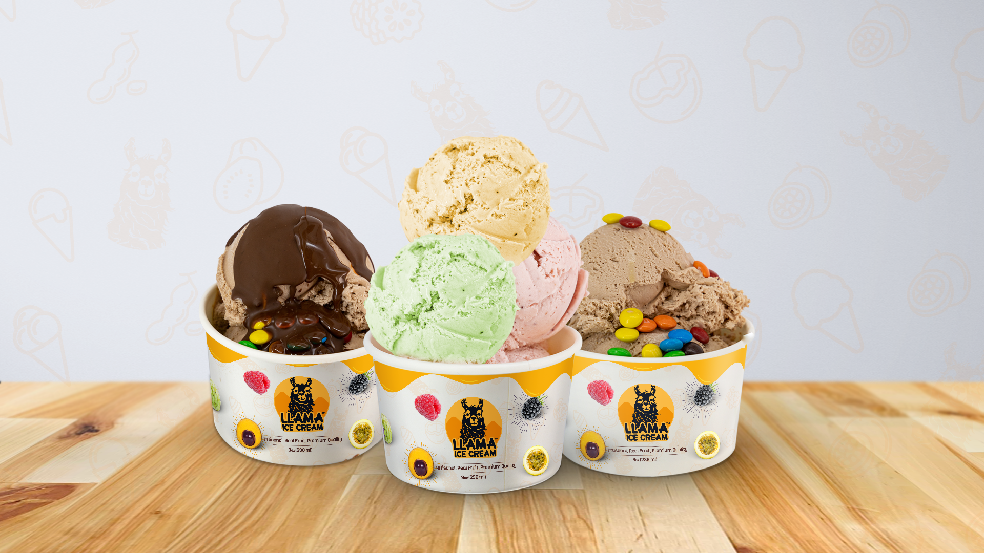 photo of three cups of ice cream on a wooden table. the label on the cup reads Llama ice cream