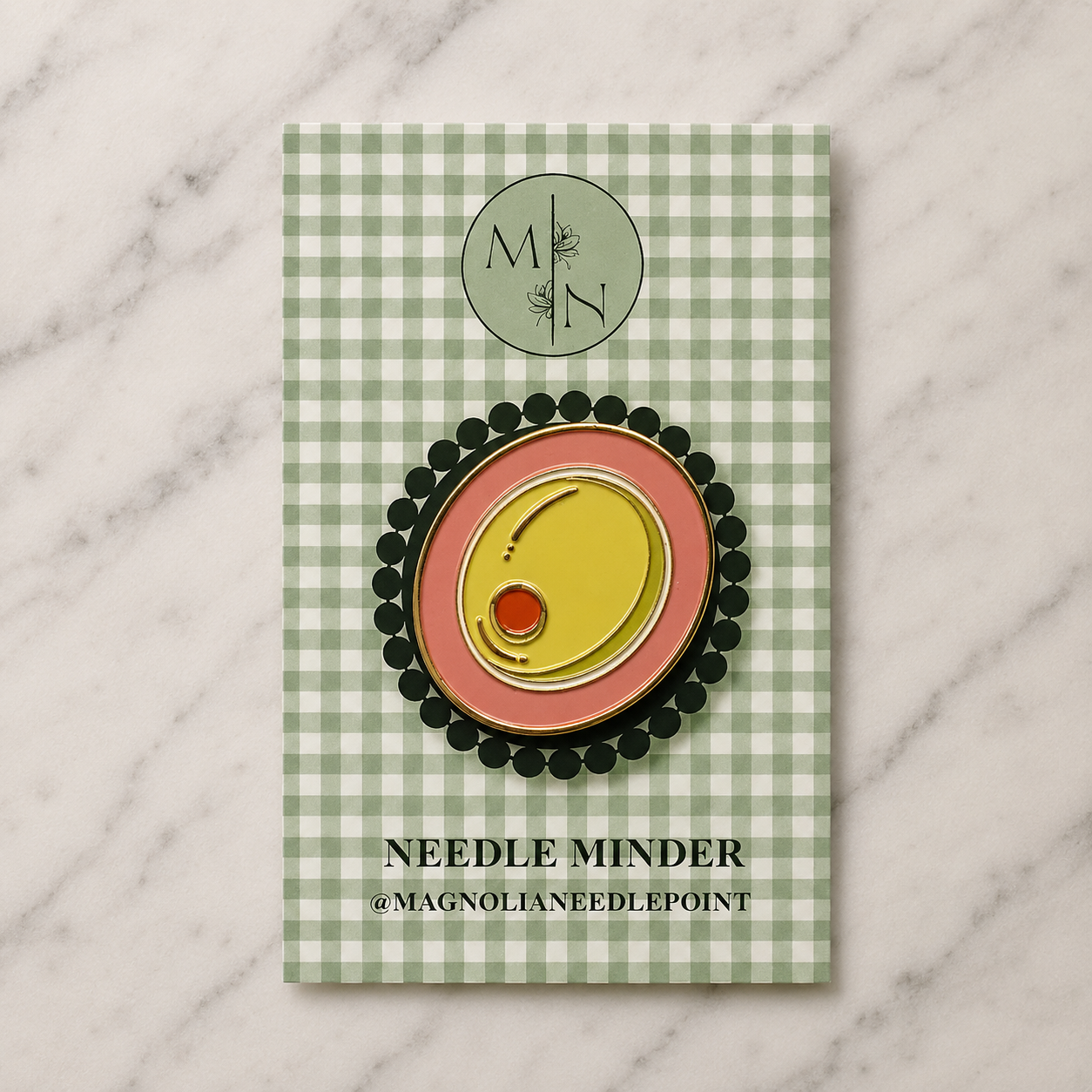 Olive Needleminder