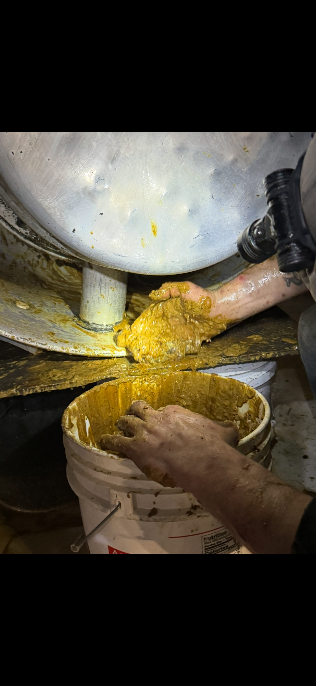 Close-up Cleaning major grease from restaurant exhaust fan