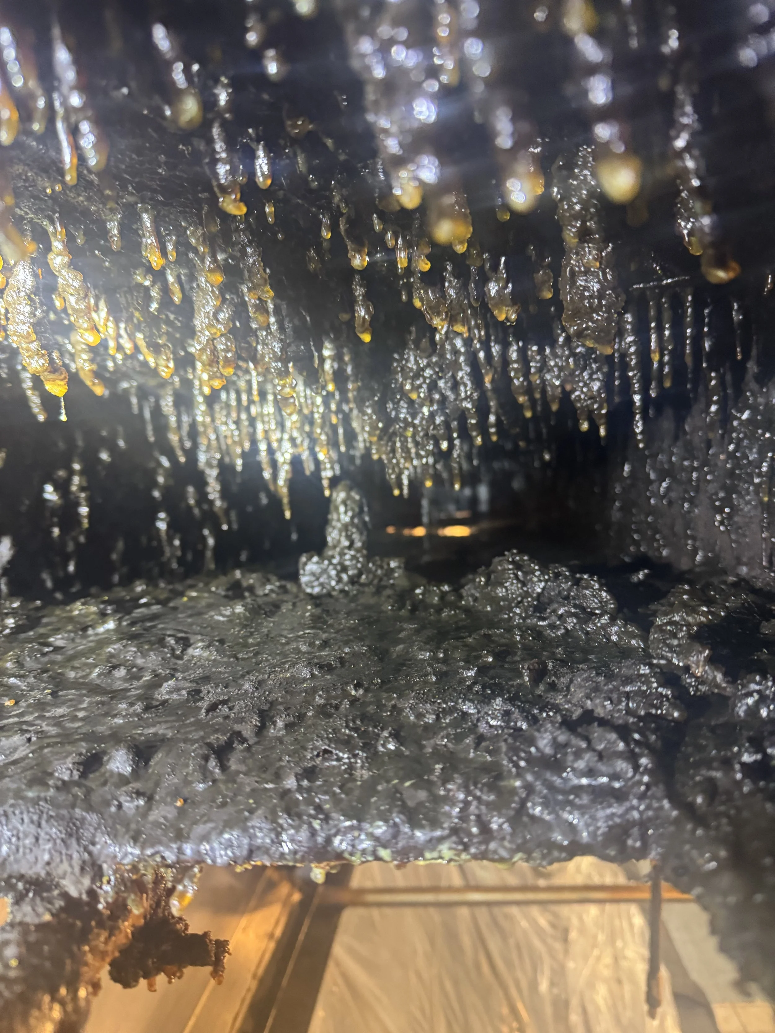 Close-up built up grease in a restaurant ductwork