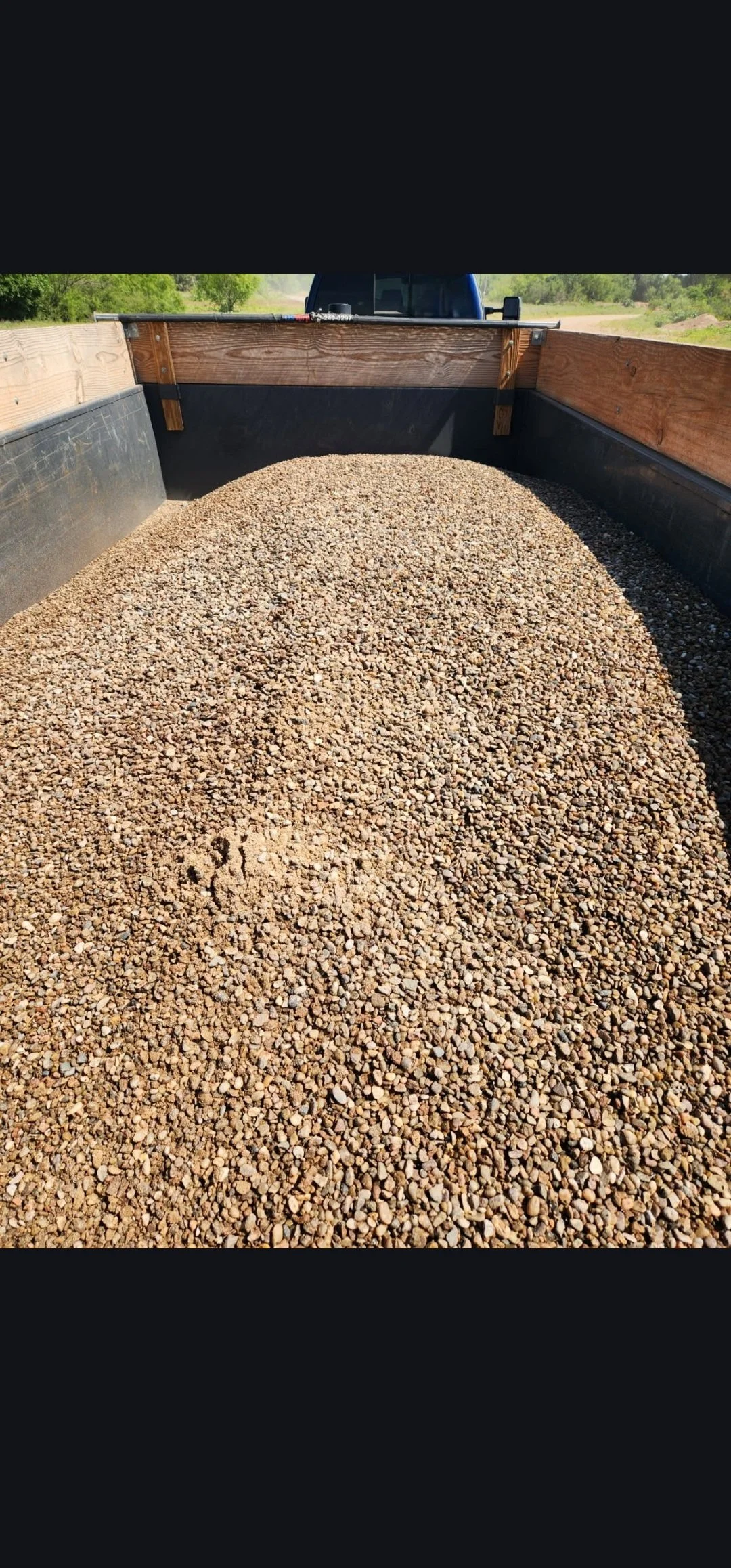 Decorative river rock delivery for landscaping projects in Oklahoma