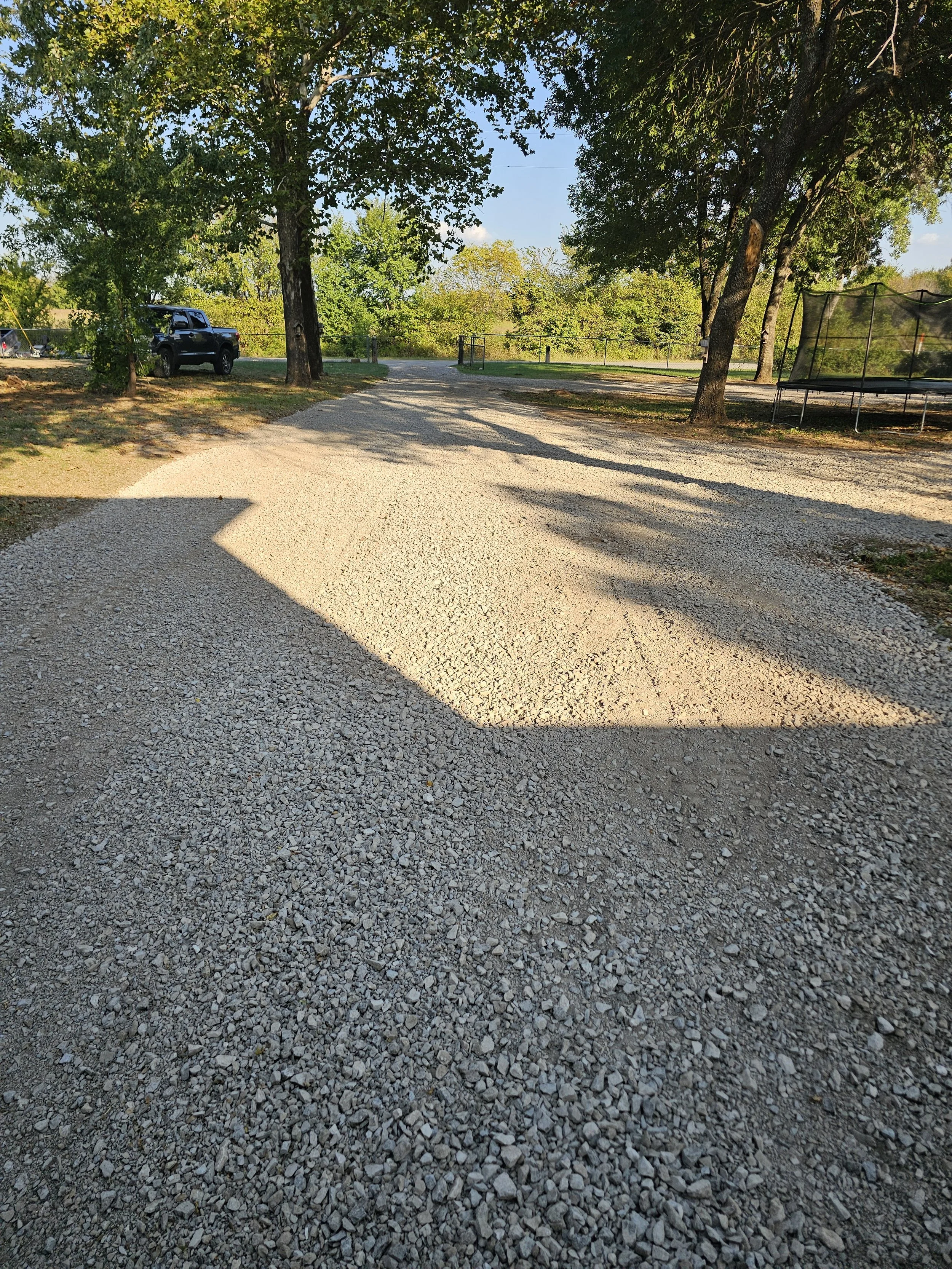 Professionally repaired gravel driveway using quality crushed stone delivered by Nubs Services