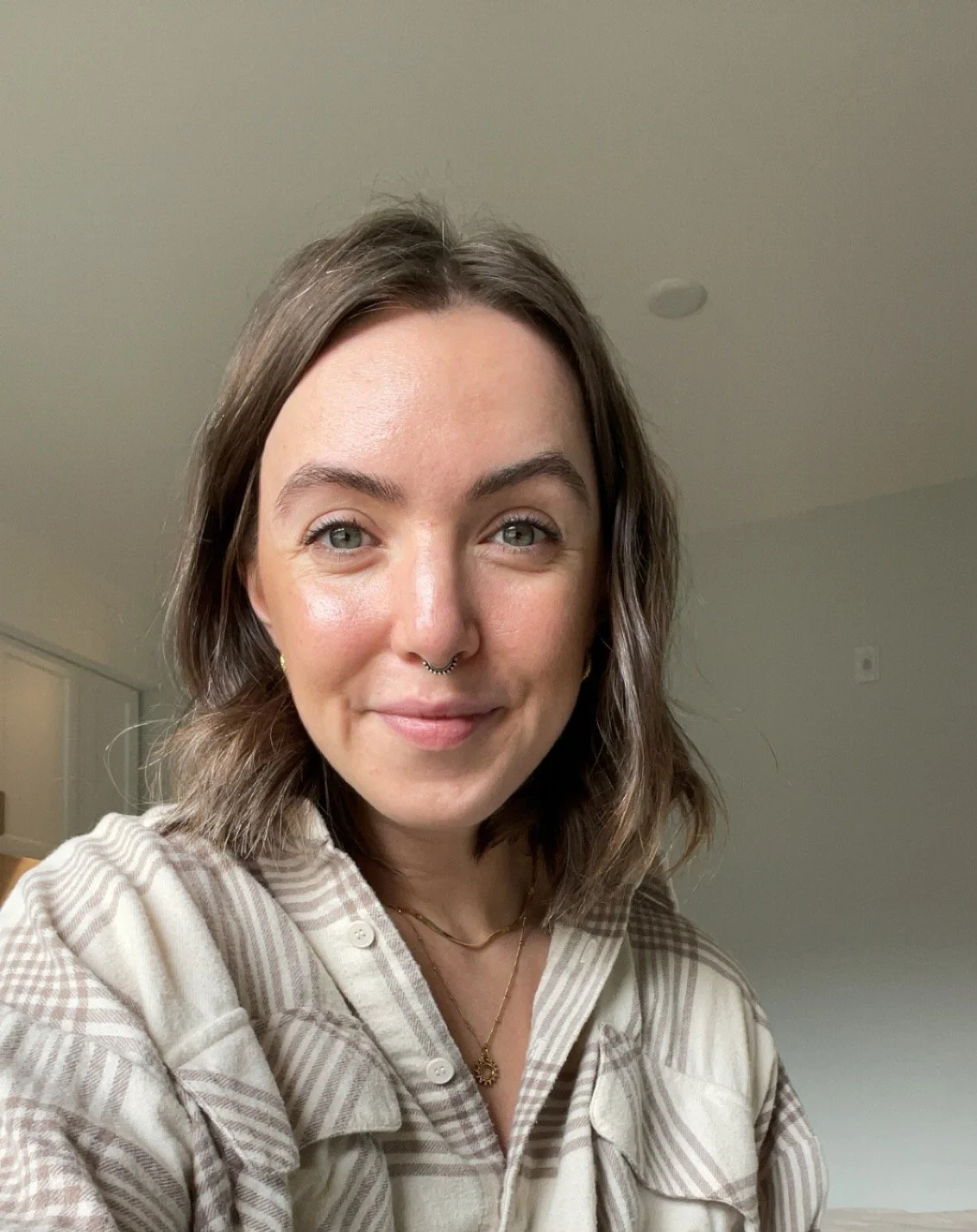 CENTRD founder Kelsey smiling in a neutral setting