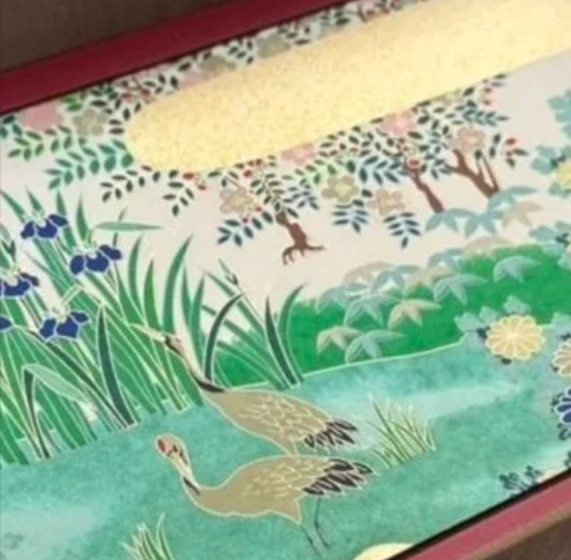 Colorful illustration of a pond with two geese, green plants, and trees in the background.