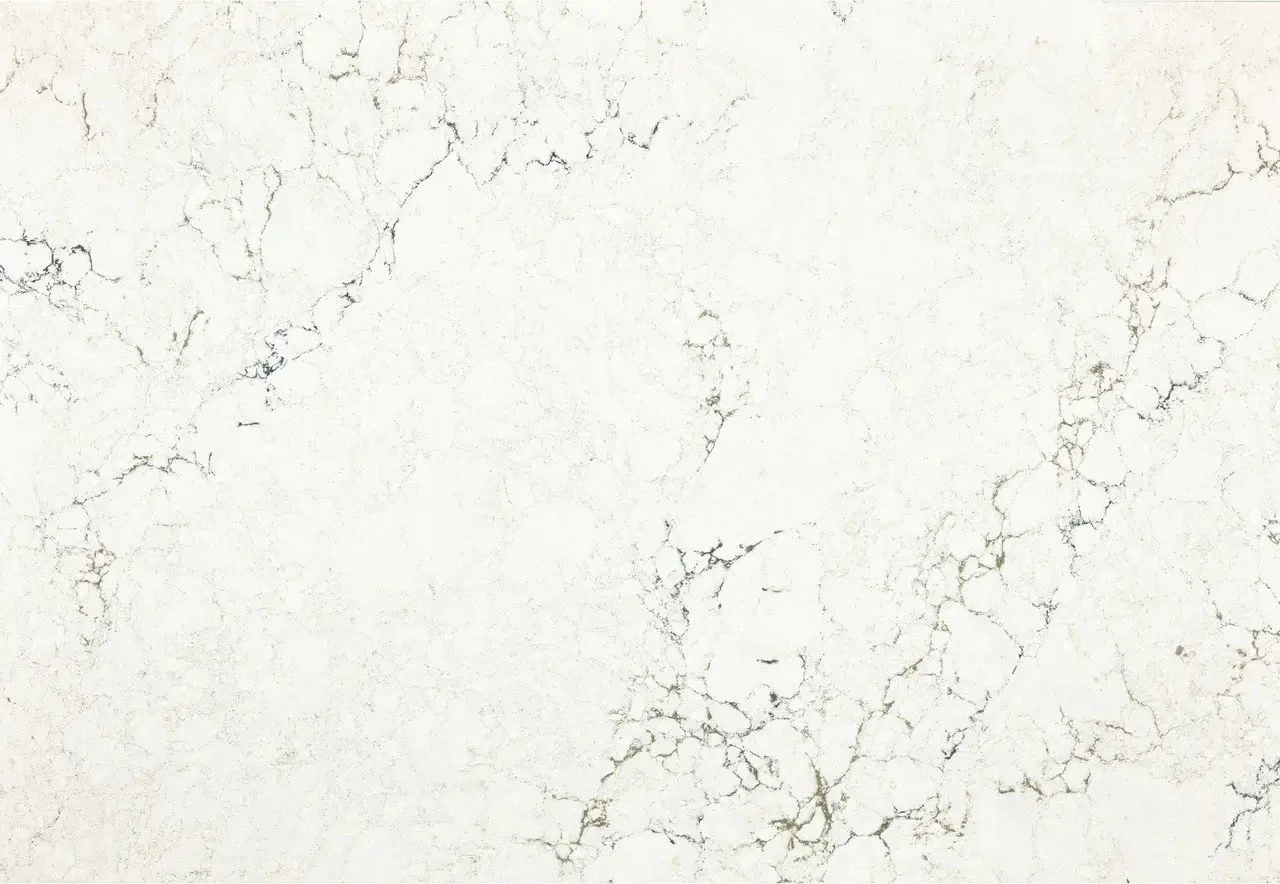 Close-up of Cambria's Whitendale quartz countertop, featuring a soft white base with subtle grey and taupe veining.