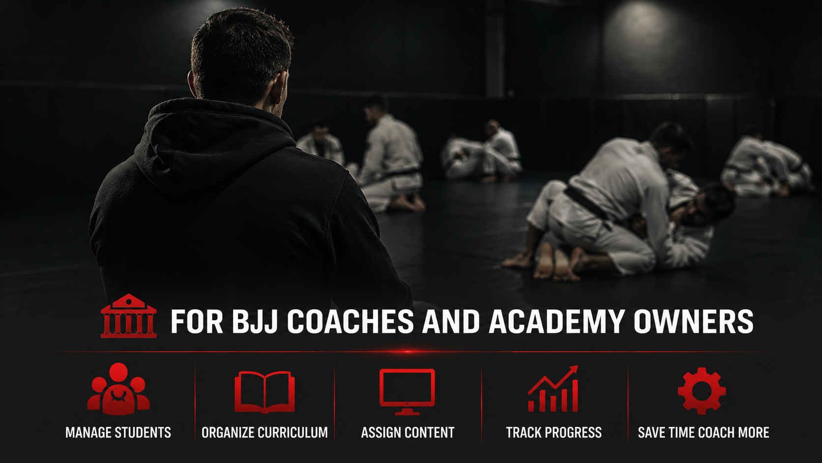 A coach observing Brazilian Jiu-Jitsu students practicing on mats in a dimly lit room, with a focus on the coach in the foreground and students training in the background.