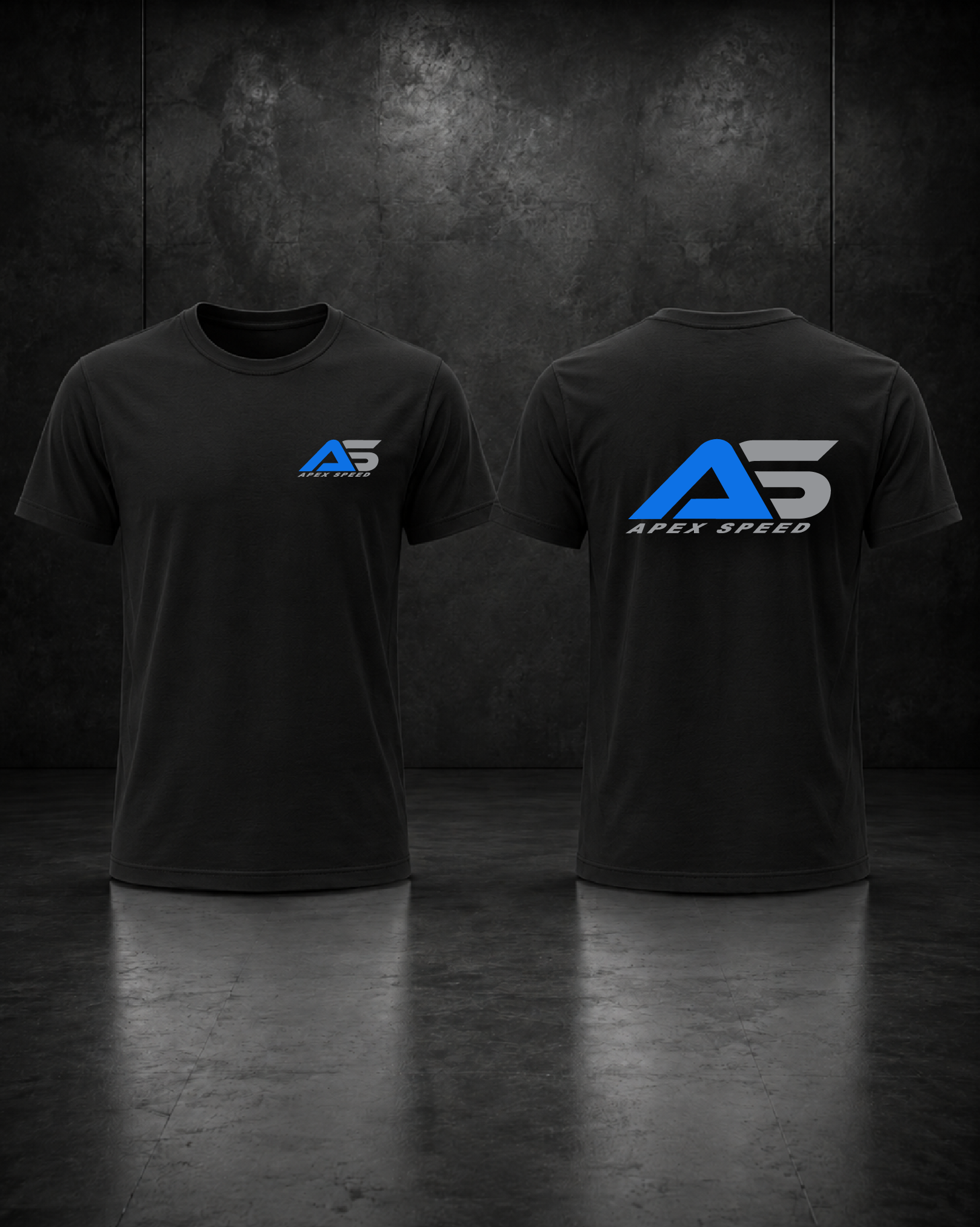 Two black T-shirts with the Apex Speed logo hanging on a wall behind a concrete floor, with the left shirt showing the logo on the front and the right shirt showing the logo on the back.