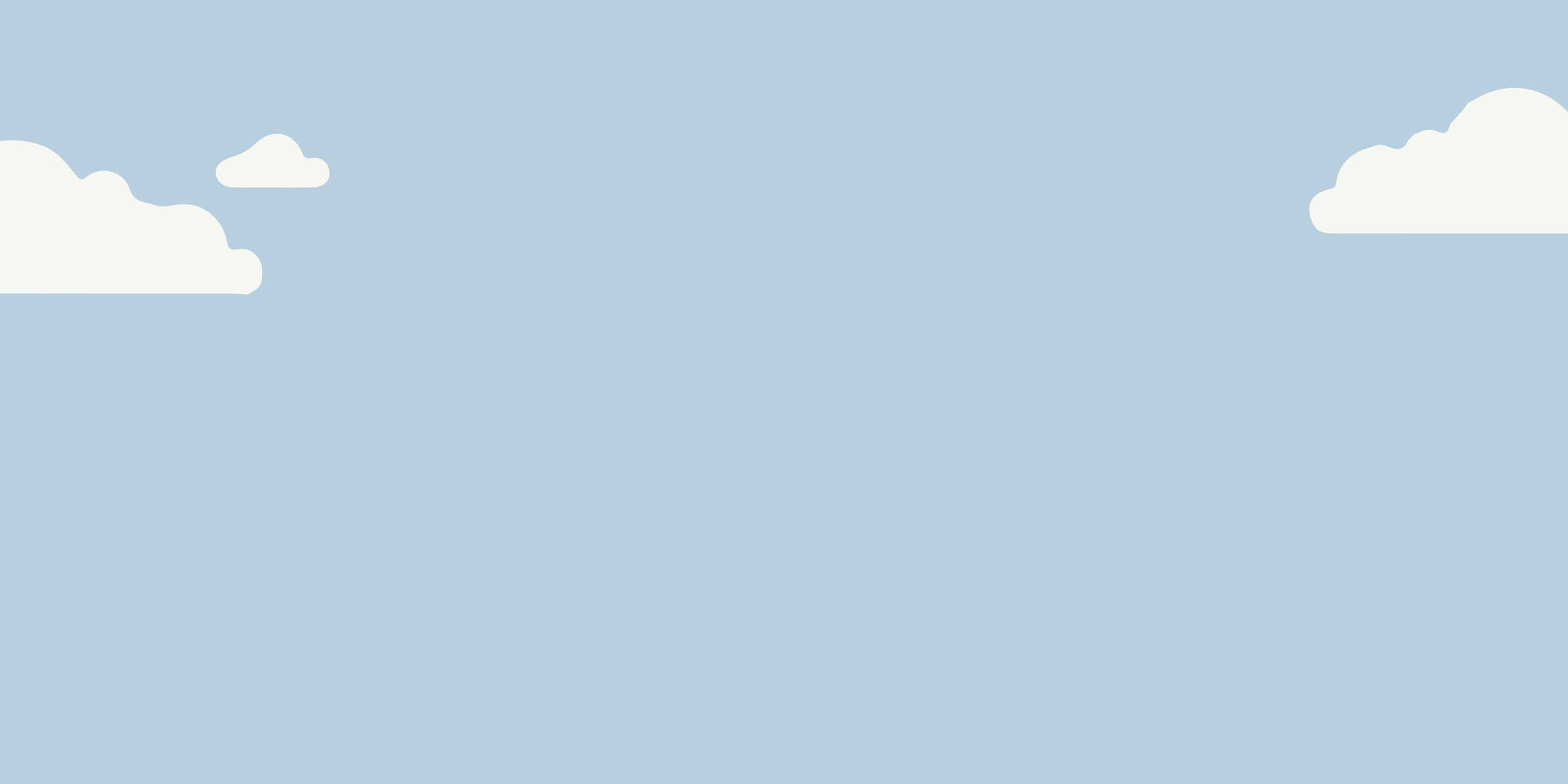 A few fluffy white clouds on top of a light-blue sky.