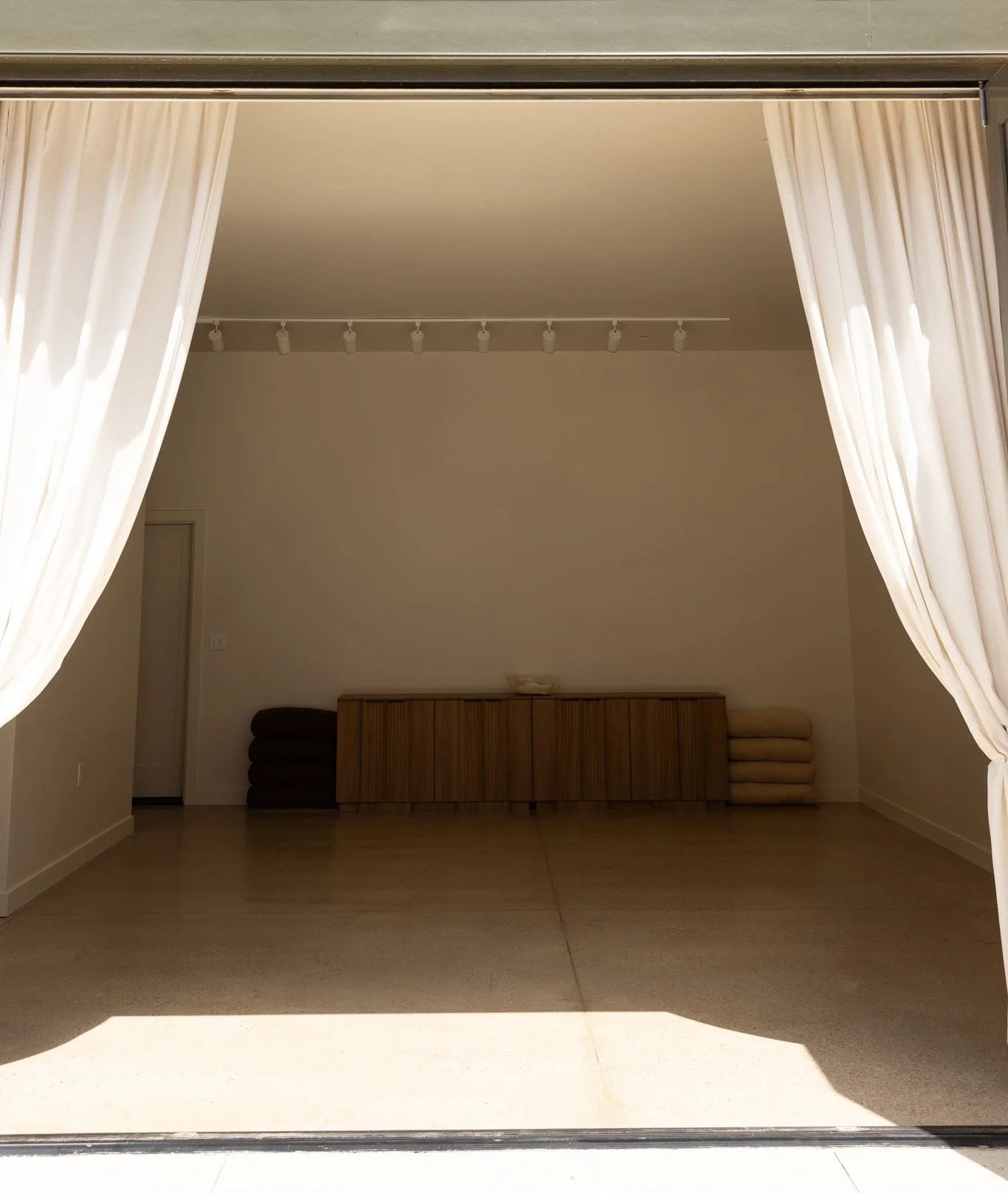 studio doors open with curtains and prop wall.jpg