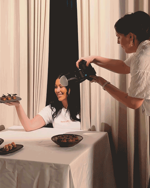 Rachel photographing new menu items at Aurora Restaurant