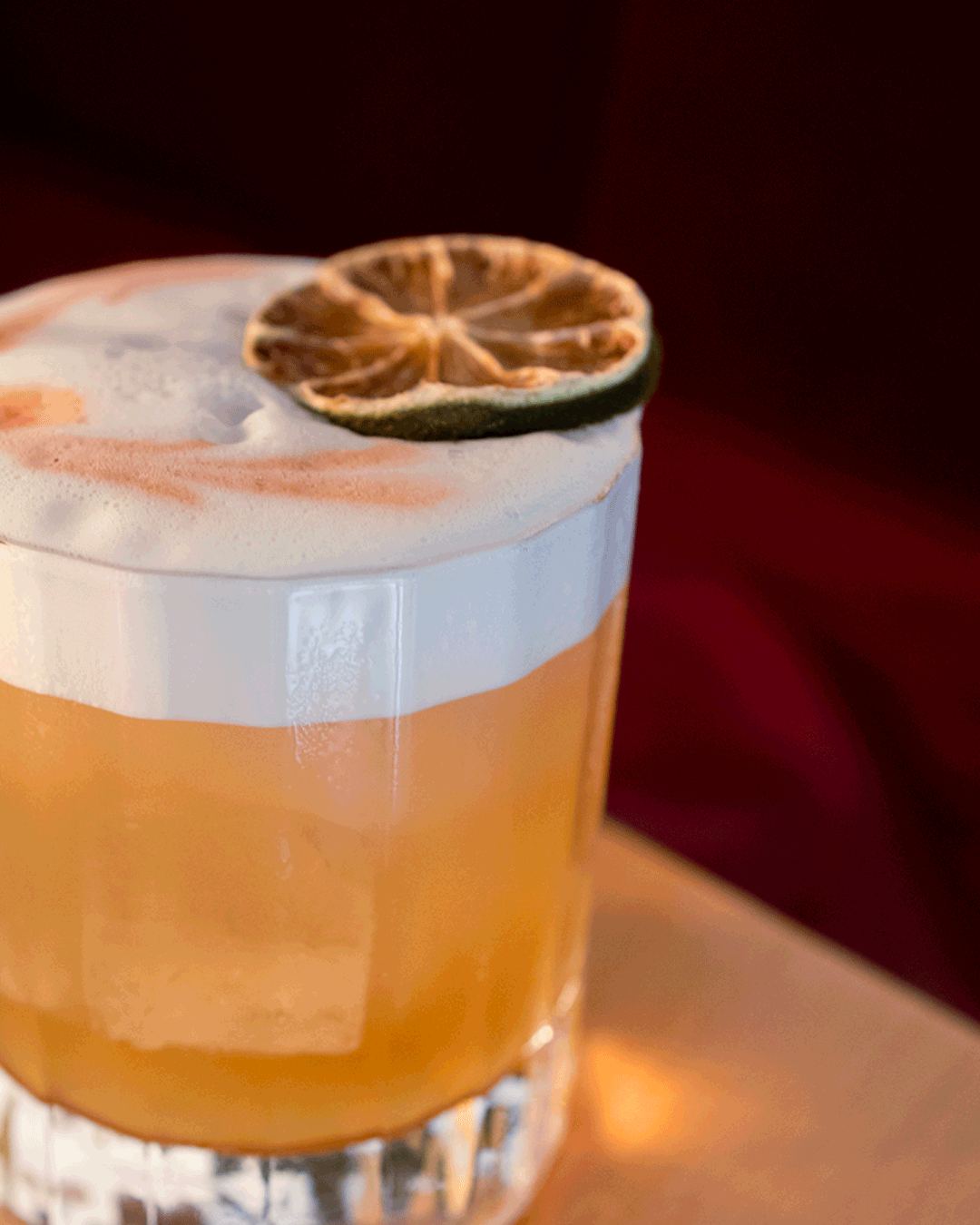An image of a whiskey sour at Aurora Restaurant