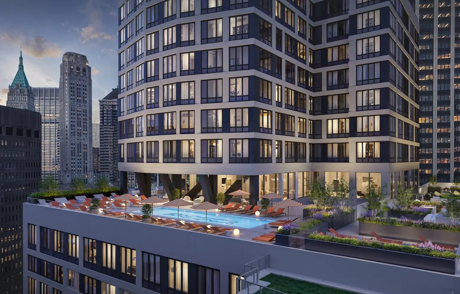 Modern high-rise building with a rooftop pool, lounge chairs, and umbrellas, surrounded by other skyscrapers in a city skyline during dusk.